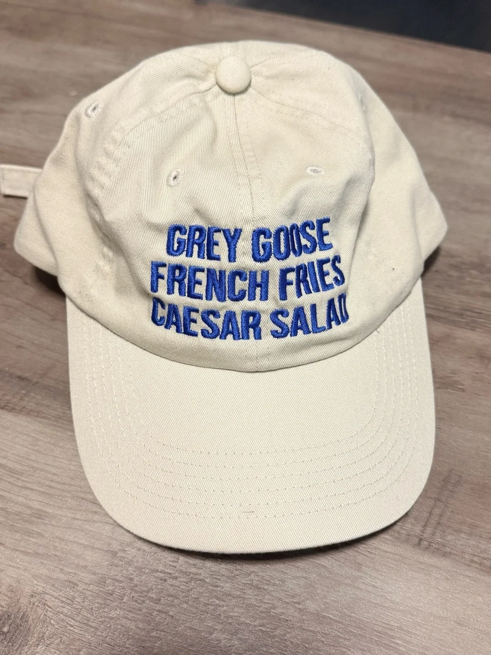 Grey Goose Cream Baseball Cap with Blue Embroidered Text